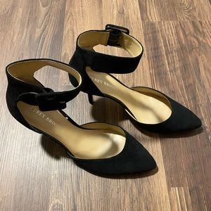 Women’s black suede ankle strap pumps